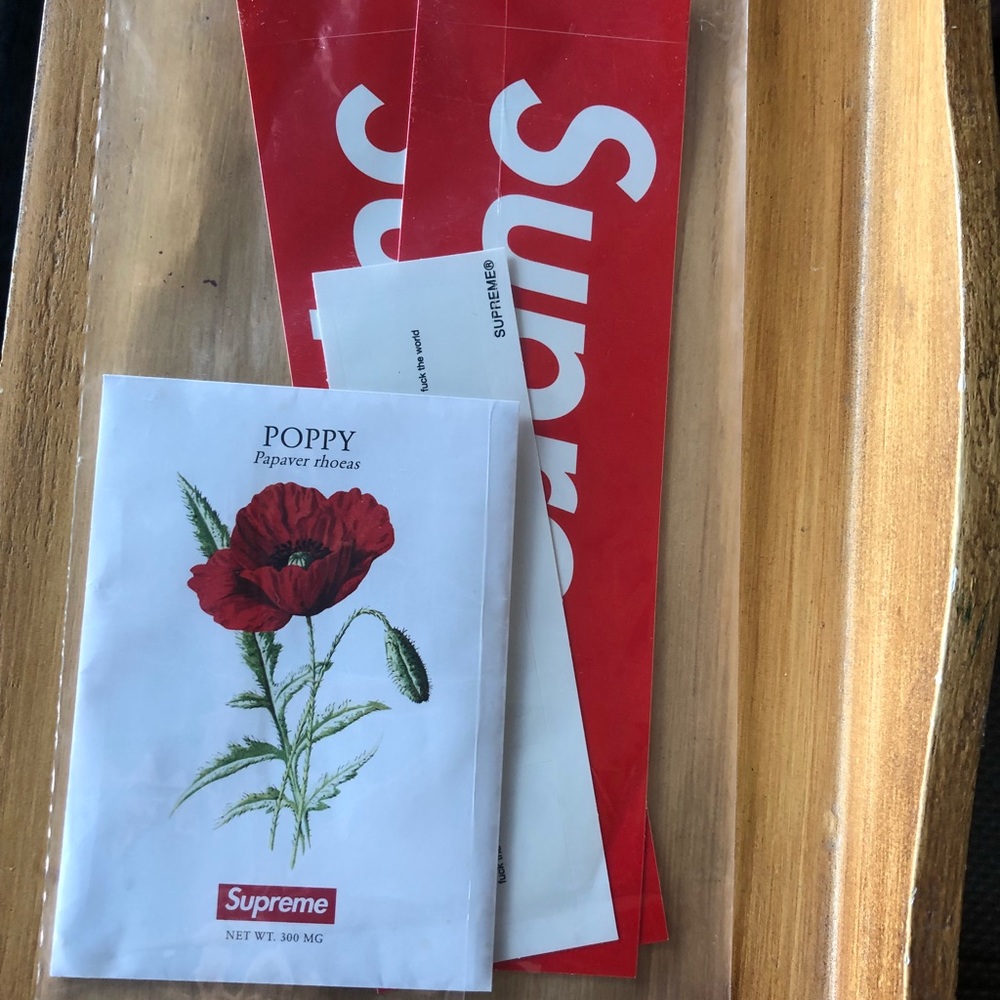 Supreme poppy seed/sticker pack
